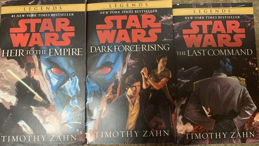 Thrawn trilogy 'Legends' version, Thrawn in background crosses Heir to the Empire and Dark Force Rising covers.. Luke is on Heir to the Empire, Han and Leia on Dark Force Rising. Thrawn is seperate facting away on Last Command.  Paperbacks